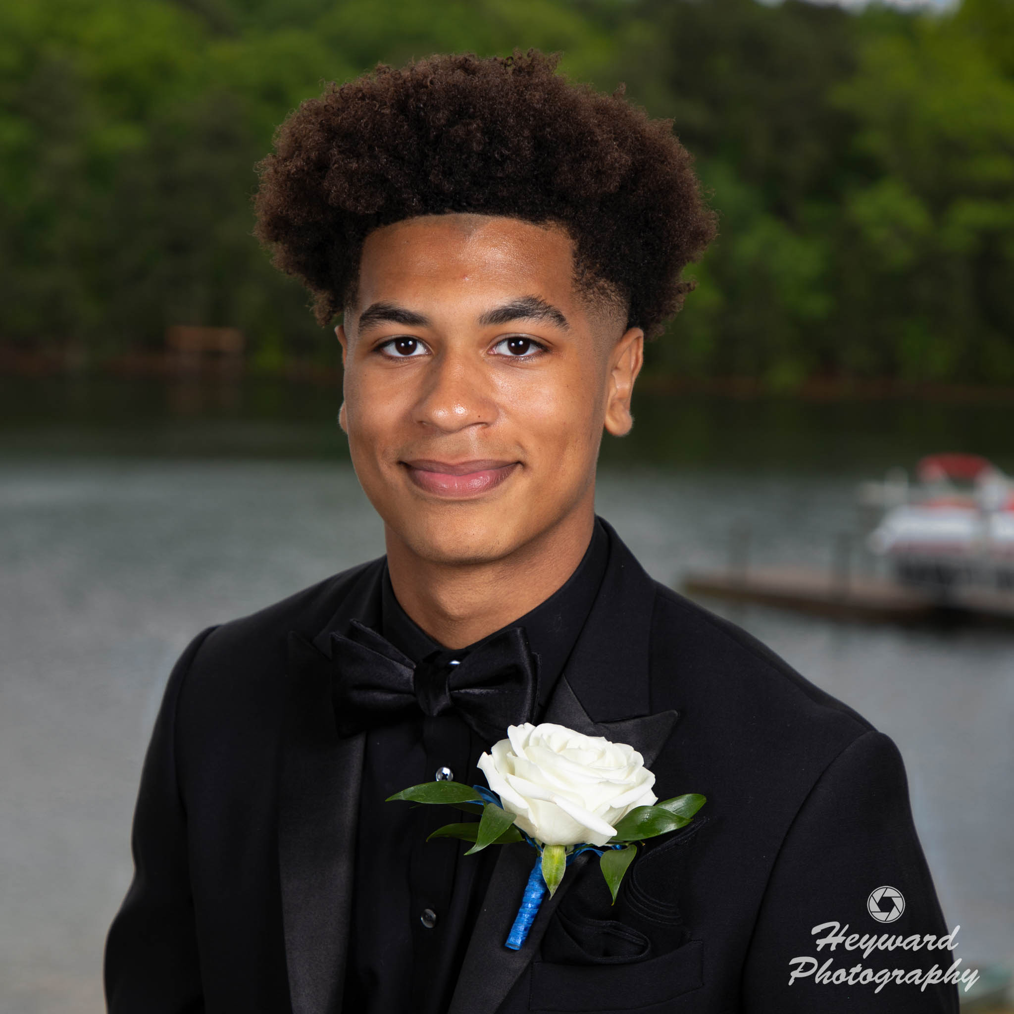 Black male posing for a photo, square crop.