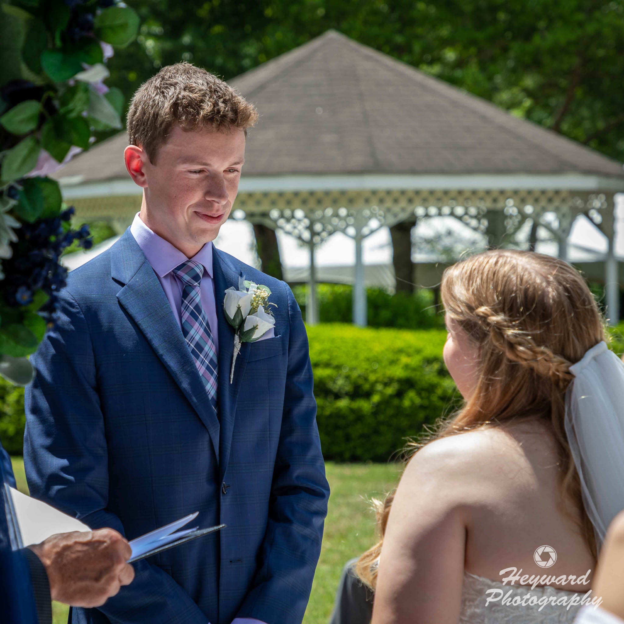 Bride and groom exchanging wedding vows.