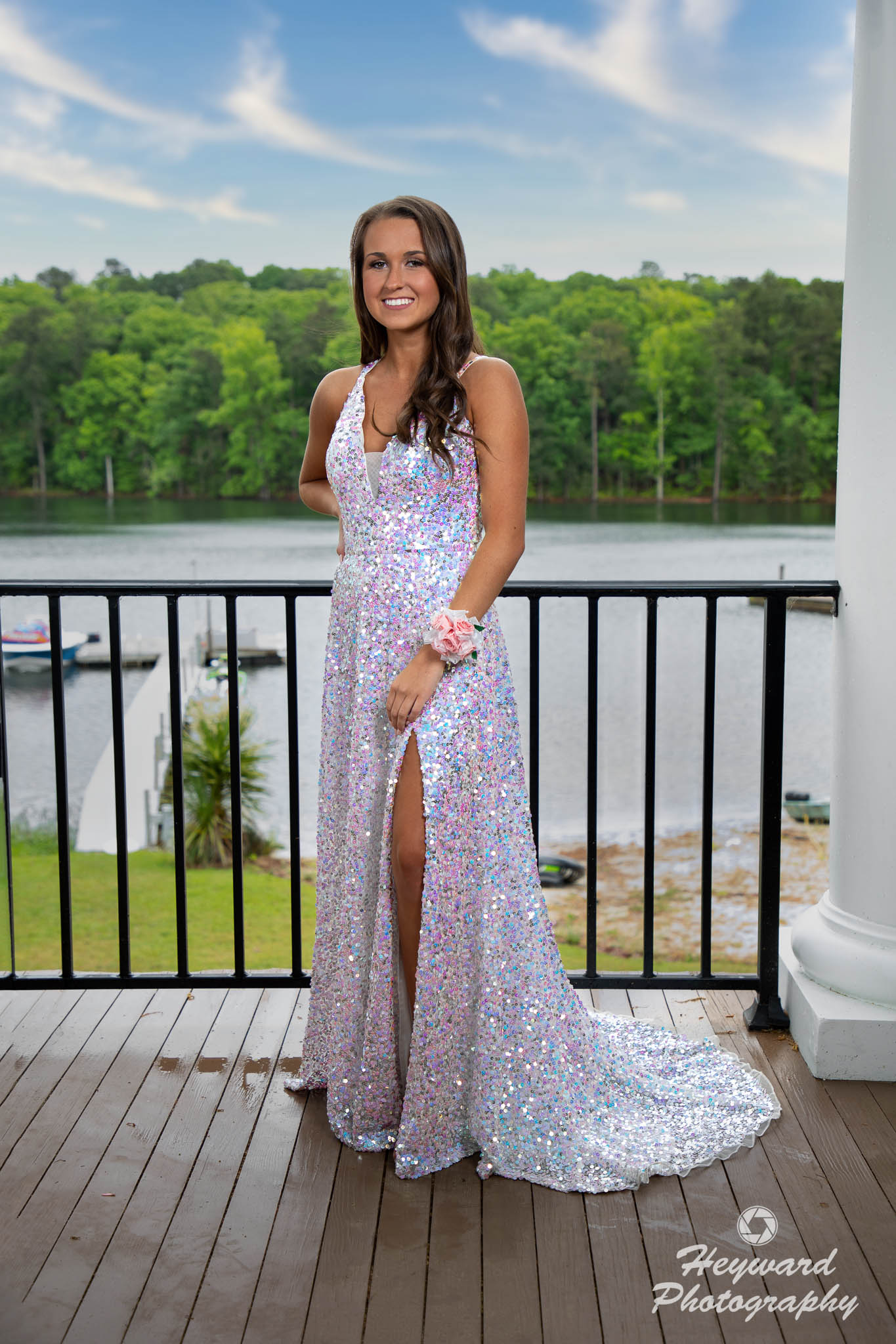 Lady in white dress, full length.