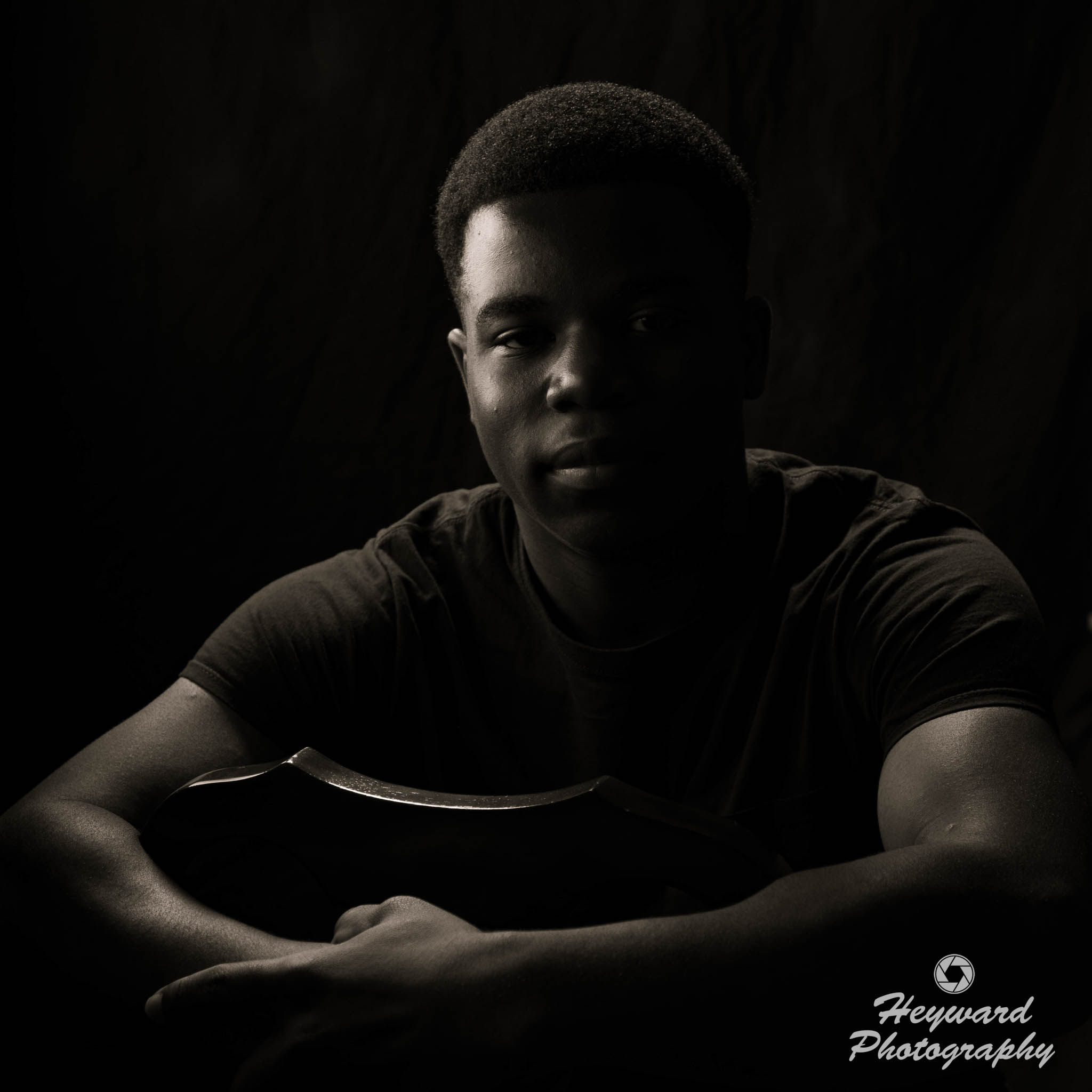 Young black man looking straight ahead. Black & White image.